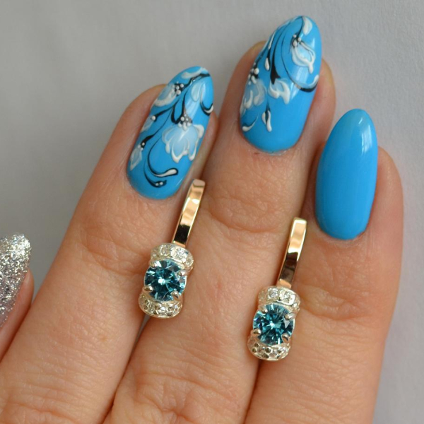 Срібні сережки з золотом