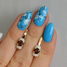 Срібні сережки з золотом