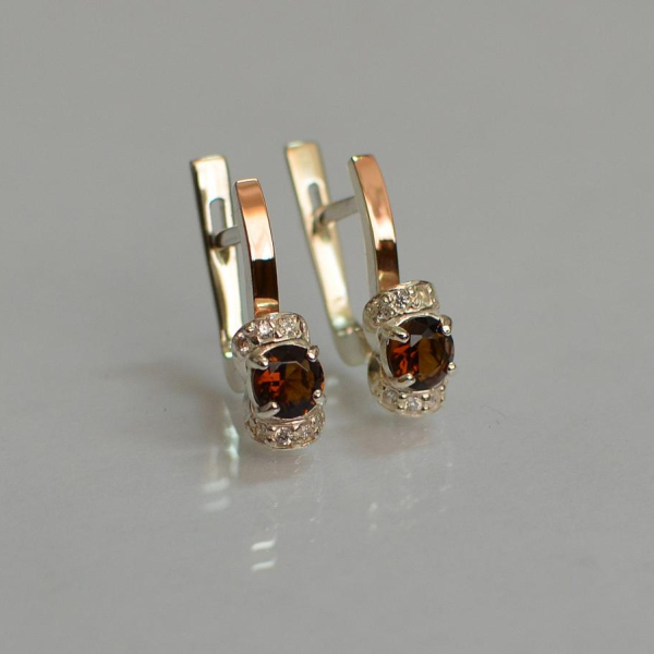 Срібні сережки з золотом