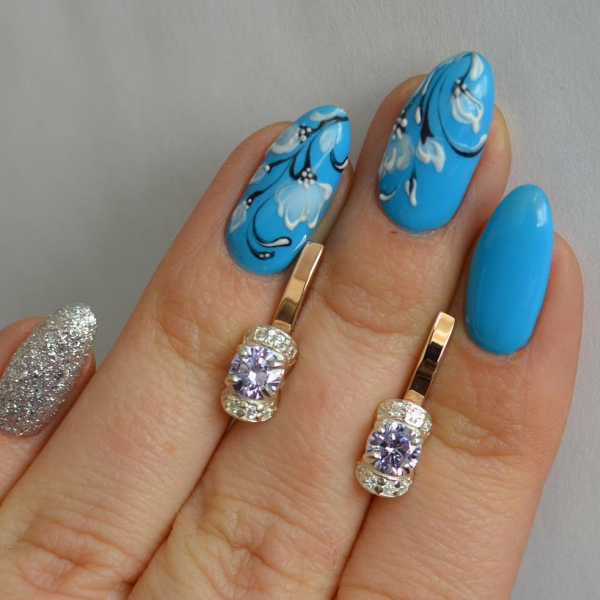 Срібні сережки з золотом