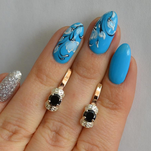 Срібні сережки з золотом