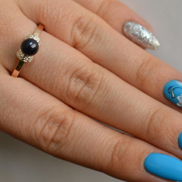 Срібна каблучка з золотими пластинами