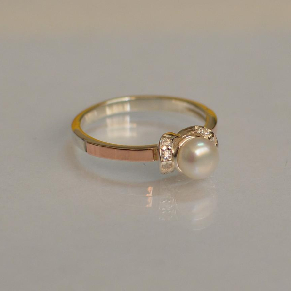 Срібна каблучка з золотими пластинами