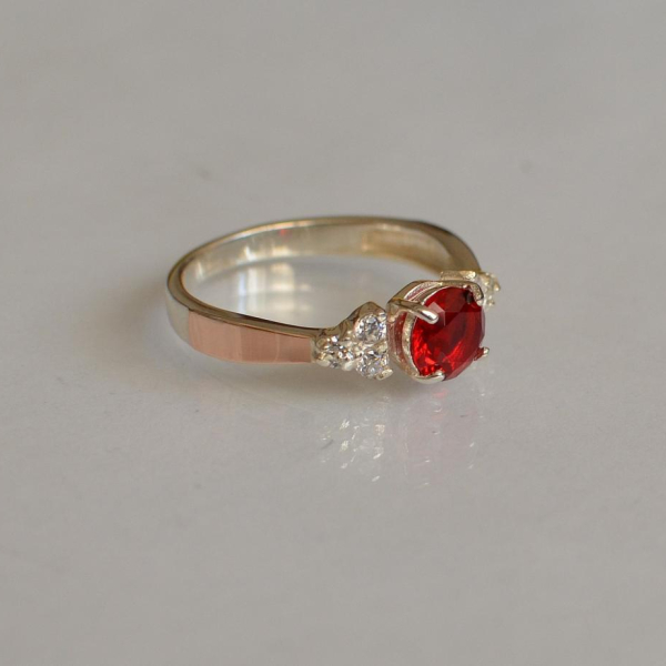 Срібна каблучка з золотом