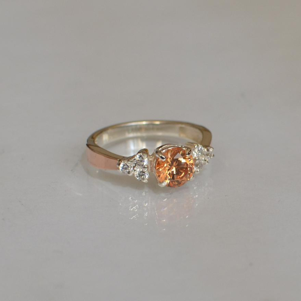 Срібна каблучка з золотом