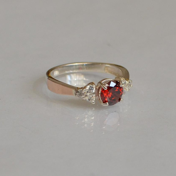 Срібна каблучка з золотом