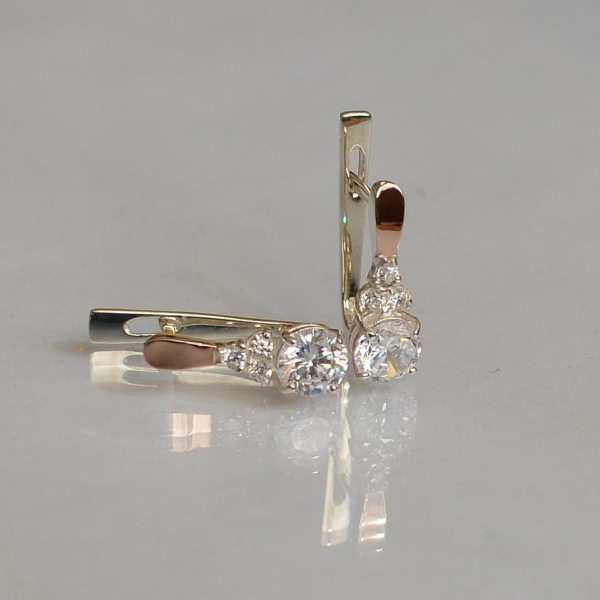 Срібні сережки з золотом