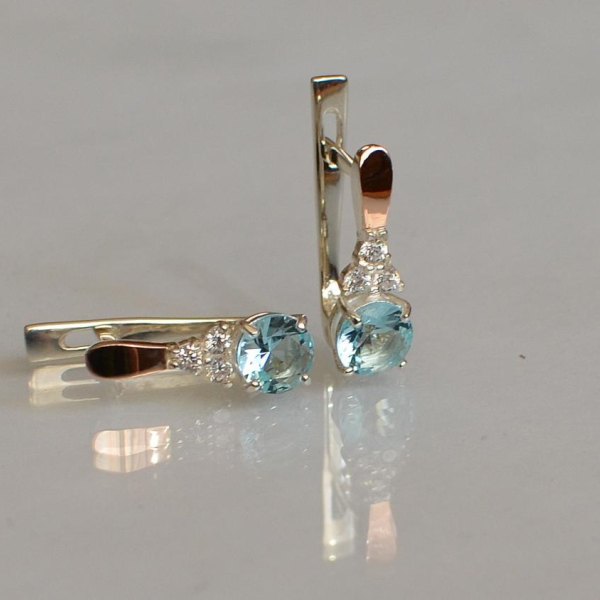 Срібні сережки з золотом