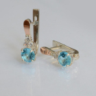 Срібні сережки з золотом