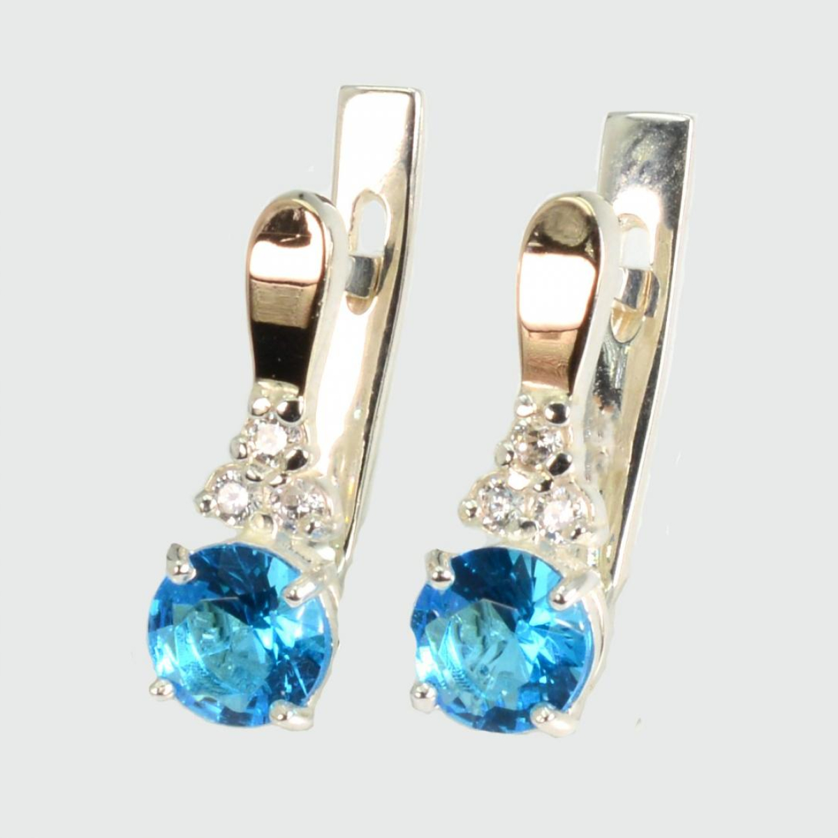 Срібні сережки з золотом