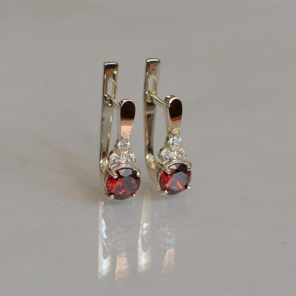 Срібні сережки з золотом