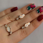 Срібний набір з золотими пластинами