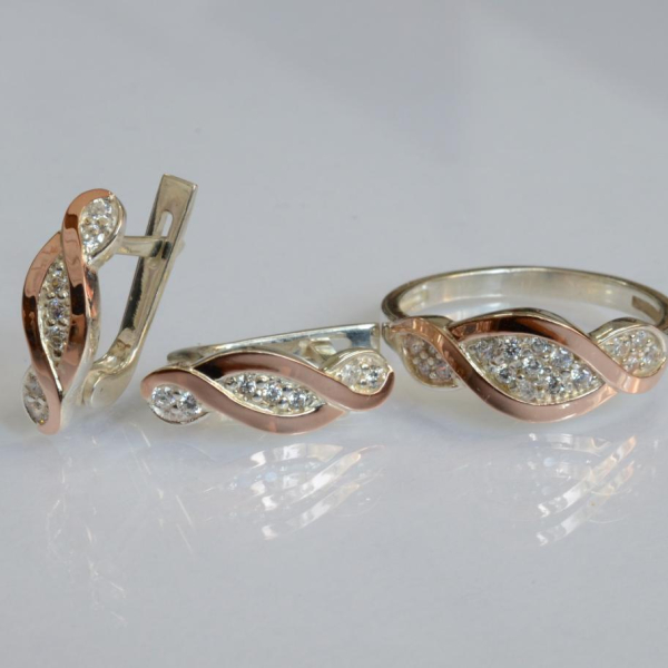 Срібний набір з золотими пластинами