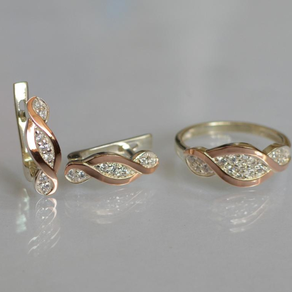 Срібний набір з золотими пластинами