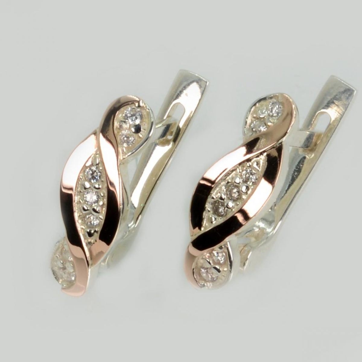 Срібні сережки з золотими пластинами