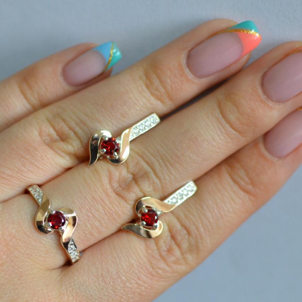 Срібний гарнітур з золотими вставками