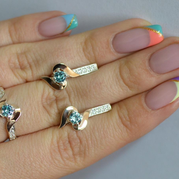 Срібний гарнітур з золотими вставками