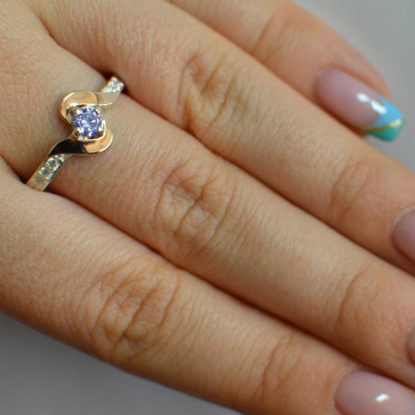 Срібне кільце з золотими вставками