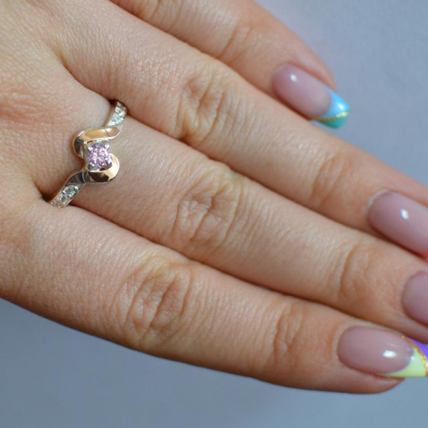 Срібне кільце з золотими вставками