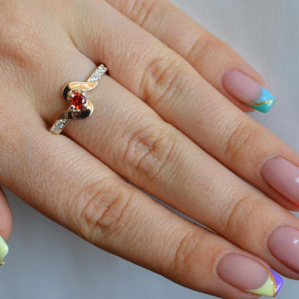 Срібне кільце з золотими вставками