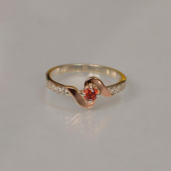 Срібне кільце з золотими вставками