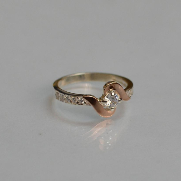 Срібне кільце з золотими вставками