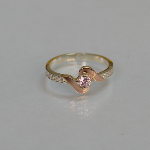 Срібне кільце з золотими вставками