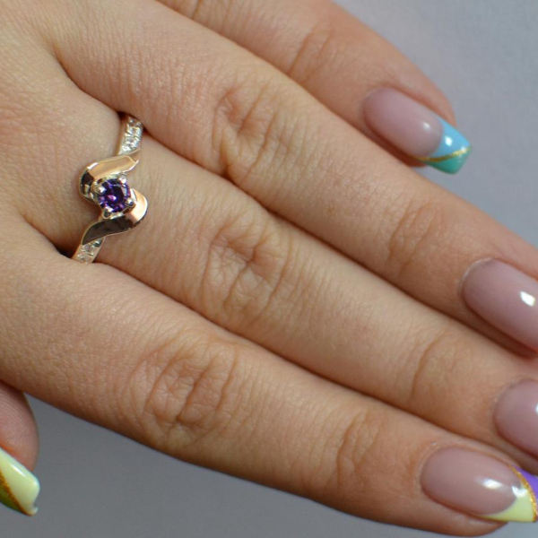 Срібне кільце з золотими вставками