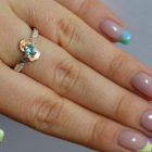 Срібне кільце з золотими вставками