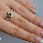 Срібне кільце з золотими вставками