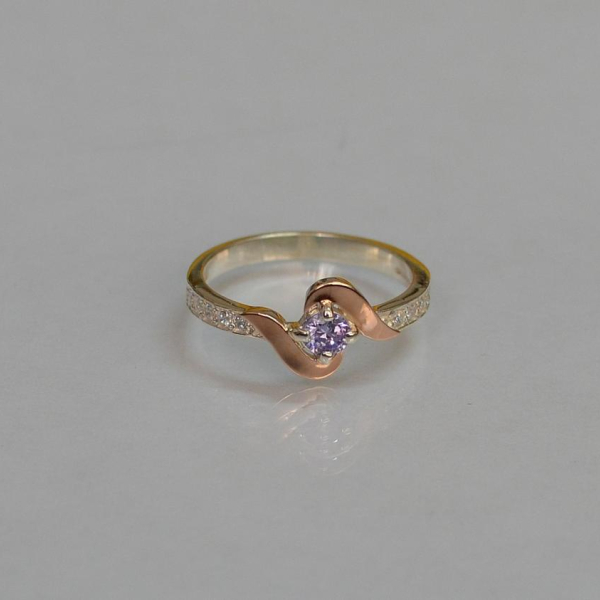 Срібне кільце з золотими вставками