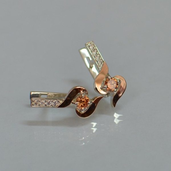 Срібні сережки з золотими вставками