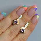 Срібні сережки з золотими вставками