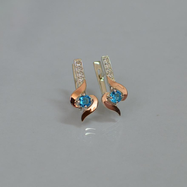 Срібні сережки з золотими вставками