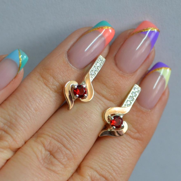 Срібні сережки з золотими вставками