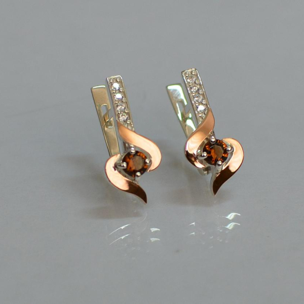 Срібні сережки з золотими вставками