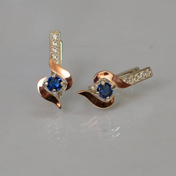 Срібні сережки з золотими вставками