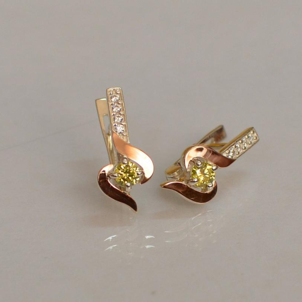 Срібні сережки з золотими вставками