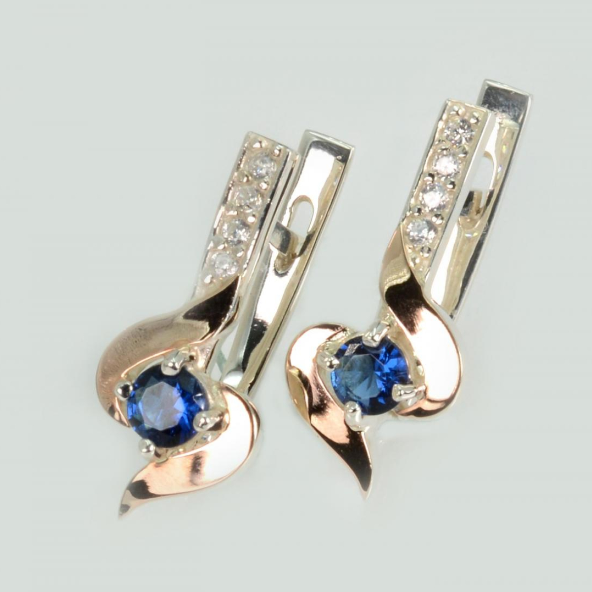 Срібні сережки з золотими вставками