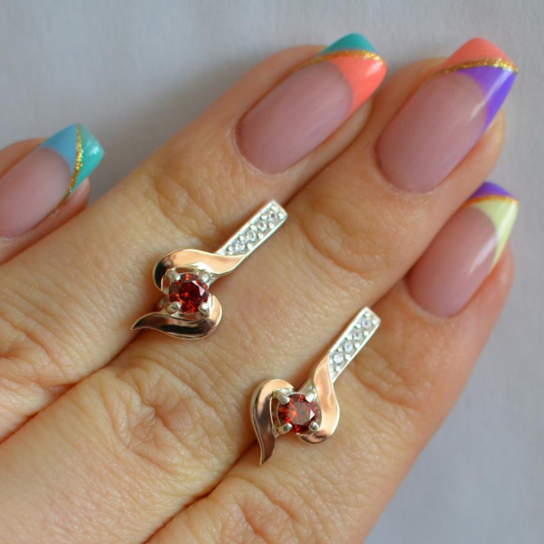 Срібні сережки з золотими вставками