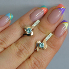 Срібні сережки з золотими вставками