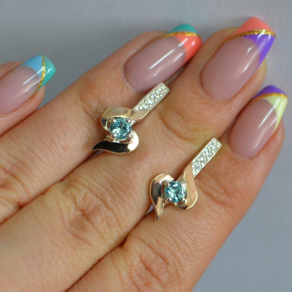 Срібні сережки з золотими вставками