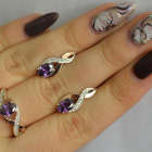 Срібний набір з золотими пластинами