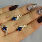 Срібний набір з золотими пластинами