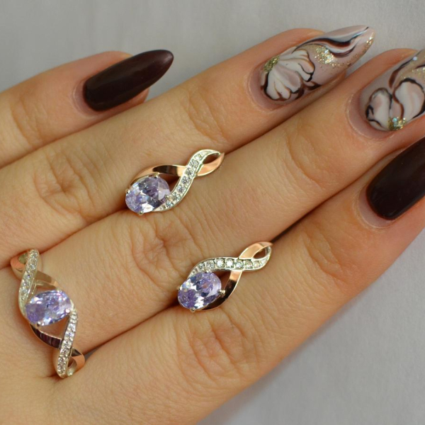 Срібний набір з золотими пластинами