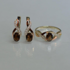 Срібний набір з золотими пластинами