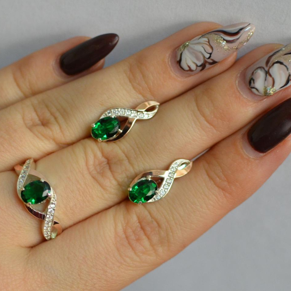 Срібний набір з золотими пластинами