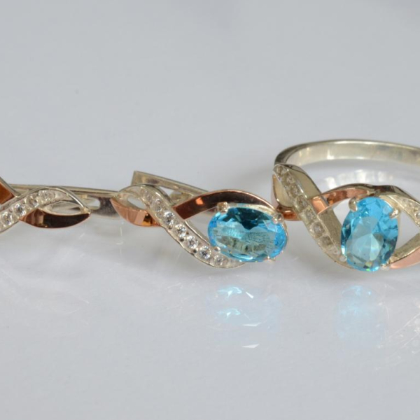 Срібний набір з золотими пластинами