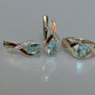 Срібний набір з золотими пластинами