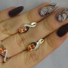 Срібний набір з золотими пластинами